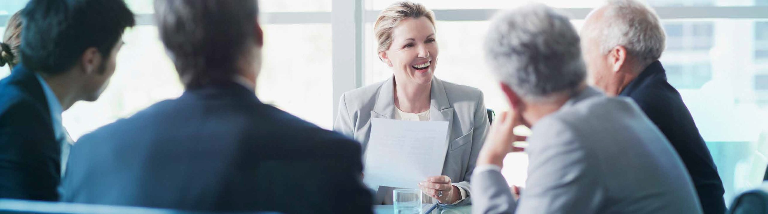 bp2 a woman smiling in a meeting